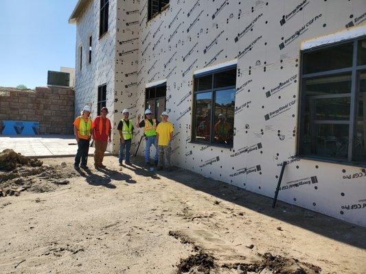 Our crews friendly faces working on commercial windows for Classic Homes.