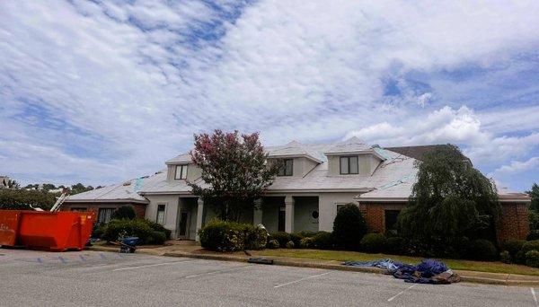 Local Vet getting roof replaced due to hail damage.