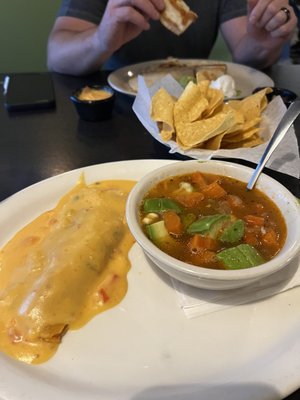 Cheese enchilada with avocado soup