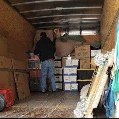 Crew packing the truck