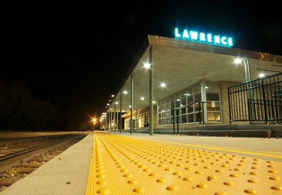 The new platform with new lighting and accessibility ramps makes boarding / alighting from the train a breeze. Note restored original neon