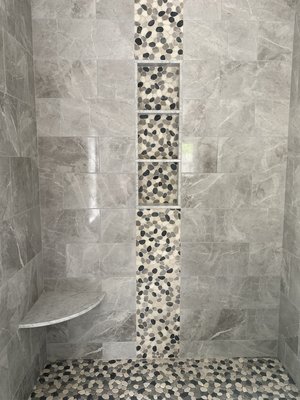 Shower niche with waterfalls