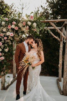 Wooded ceremony site with our tree arbor