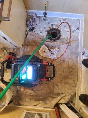 Water jetting and video inspection of a residential main sewer.