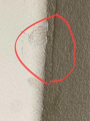 Damage to a hallway pillar/column