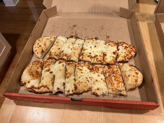 Two orders of cheesy breadsticks