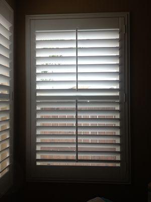 Custom shutters with split tilt.  Wood shutters. Made in USA