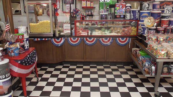 Caramel Corn store the fabulous and the sweetest smells that you can see  the checkerboard tile floor .