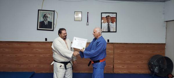 Receiving my Nidan from Hoff Sensei 5th Dan