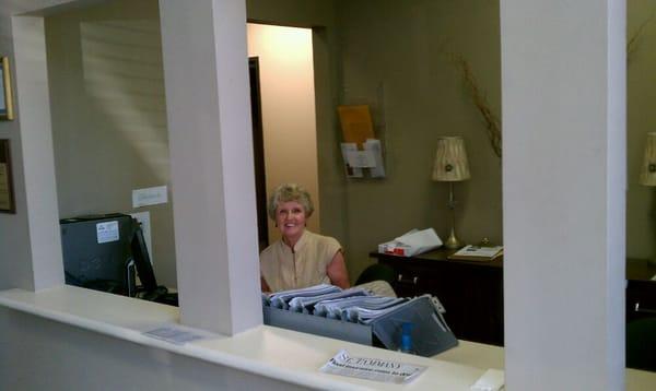 Peggy Harrison working desk helping our clients find new homes!