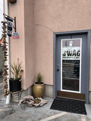 Front door located on Magnolia Street in the alley on the left after you pass Aslan brewery