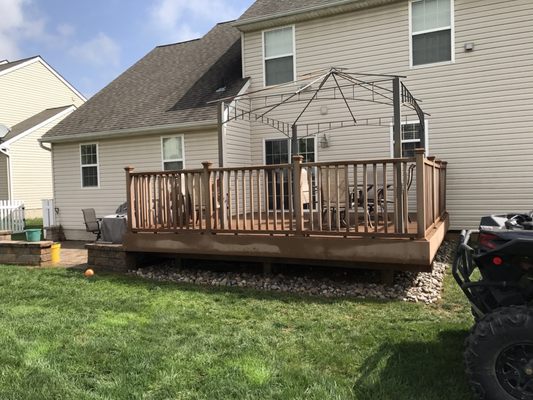 Power washed the deck (still drying) cleaned underneath and matted and installed river rock