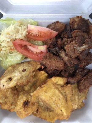 Enjoyed an order of griot (comes with fried plantain, salad, & pikliz. Love the "take out" aspect of a Haitian home cooked meal