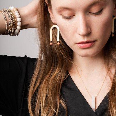 Jewelry that makes a statement and gives back to causes that support women.