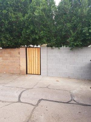 Manuel installed the custom door + block wall on the right. We didn't care about color, just that it was done well and completed fast!