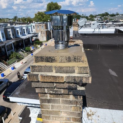 Chimney liner completed to restore hot water!