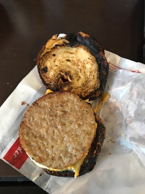 Extremely burnt croissant sandwich