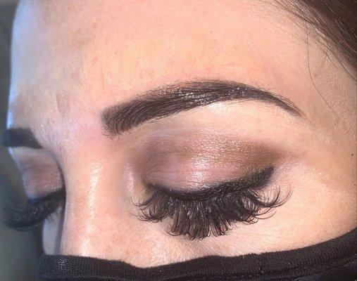 Finished look of henna tint and wax over micro bladed brows