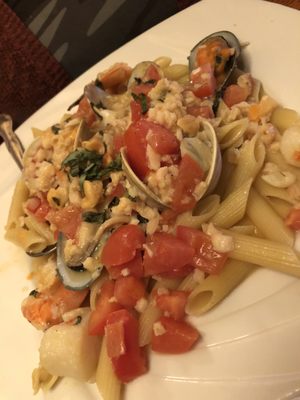 Shrimp, Scallops, Clams and Mussels over penne with a white wine sauce