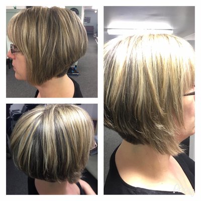 Angled bob haircut with shaved nape and blonde highlights. By Brittany.