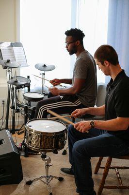 Learn how read drum sheet music, play with songs, play to a metronome and more!!