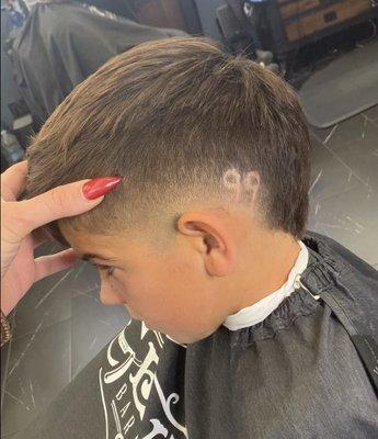 Great with kids! He wanted his jersey number in a hair design