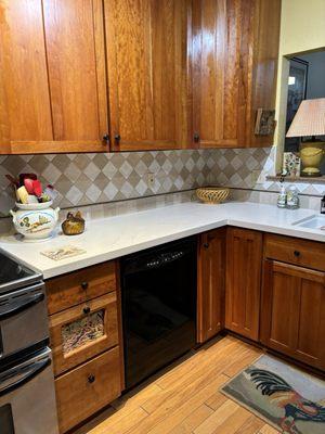 View of counter and backslash I had tile countertops and kissed them goodbye! Looks fresh and modern.