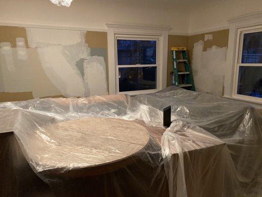 BEFORE. We had painted a bunch of swatches to choose the color and there was so much plaster repair!