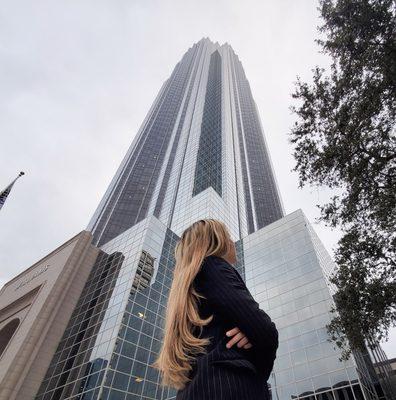 Stephanie Alfonso in front of our Galleria Office in Williams Tower.