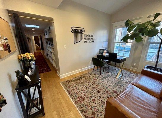 Front desk and waiting area. Cozy and relaxing!  cred: Global Wellness Options