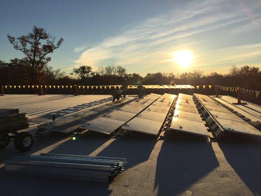 Beauty, even here on this frigid morning.  Ballasted roof mount, Albany, NY