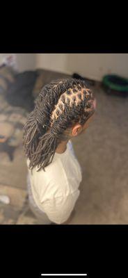 Locs and a style.