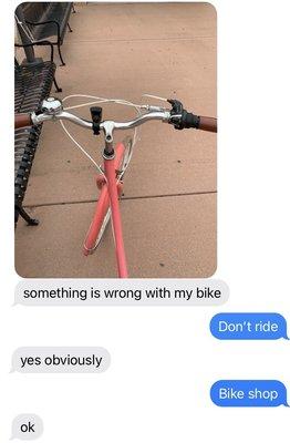 Tweaked handlebar and tire and my very succinct replies to my daughter (in my defense: I was in a meeting!)