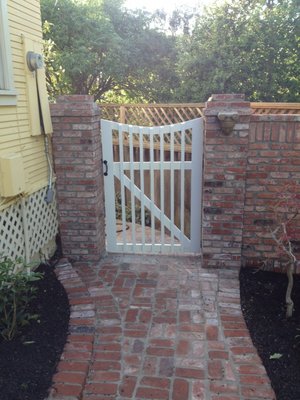 Brick Fence and Wooden Gate