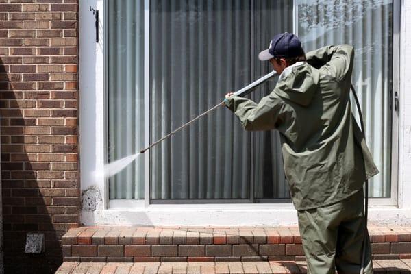 amruss powerwashing our backyard porch