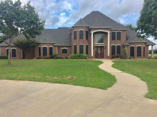 New Roof, Screens, and Seamless Gutters by Stallion Roofing and Construction