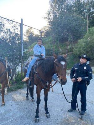 My grandson on an Officers horse & the Officer