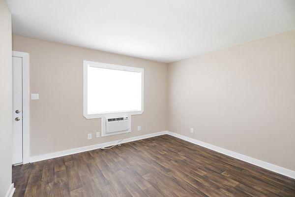 LIVING ROOM, HARDWOOD LIKE FLOORS THRU-OUT DOWNSTAIRS.