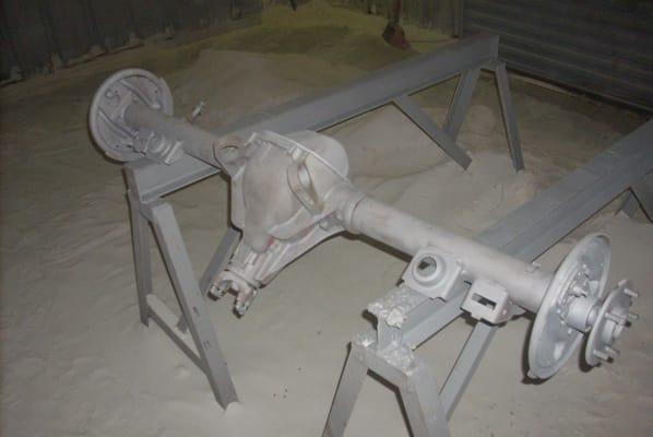 We sandblast and powder-coat car parts in house.