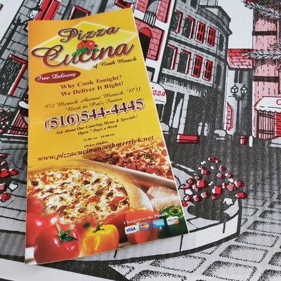 Menu and pizza box, lunch delivered