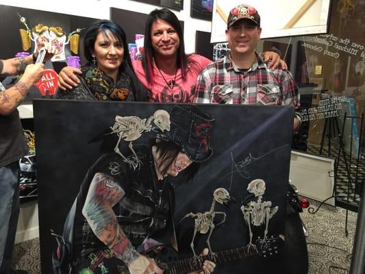 Vicki, Michael and Rob holding a beautiful original Stickman.