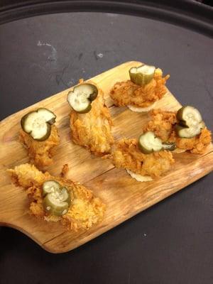 Fried oysters with house made pickles.