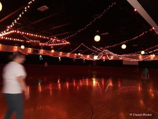 Very Christmasy/romantic mood feel on the rink floor.