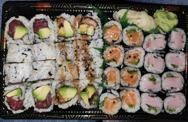 Left to right: tuna avocado.  Eel avocado.  Salmon , yellowtail scallion