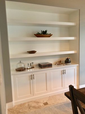 Long Painted floating shelves with base cabinets