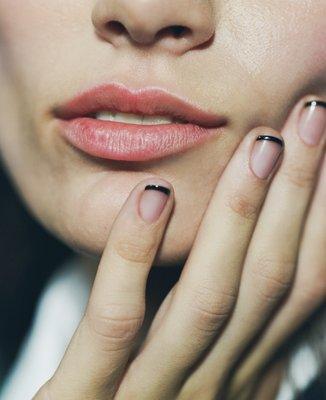 The French Line - a thin black tip for a chic, minimalist update to a classic French manicure