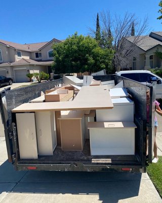 Garage cabinets and chest freezer.