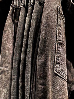 Distressed black denim wash