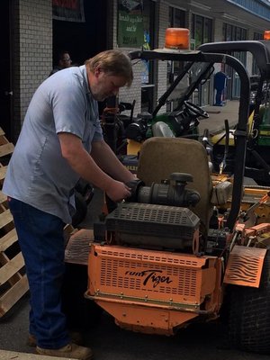 Dewayne working on a Scag Mower