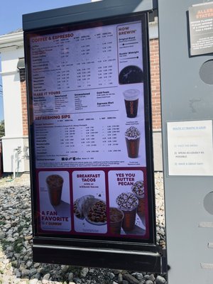 Drive-thru menu. Note the small sign to the right "SPEAK AS LOUDLY AS POSSIBLE"